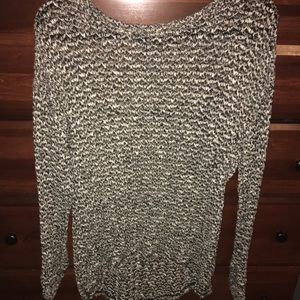 Black, white and a little gold sweater